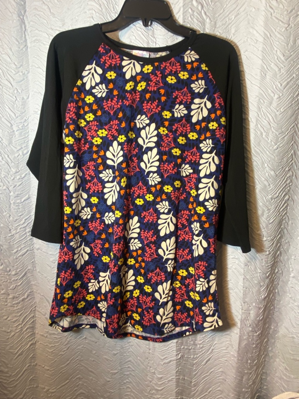 LuLaRoe Navy Floral Tee with Black Trim and Bright Blooms